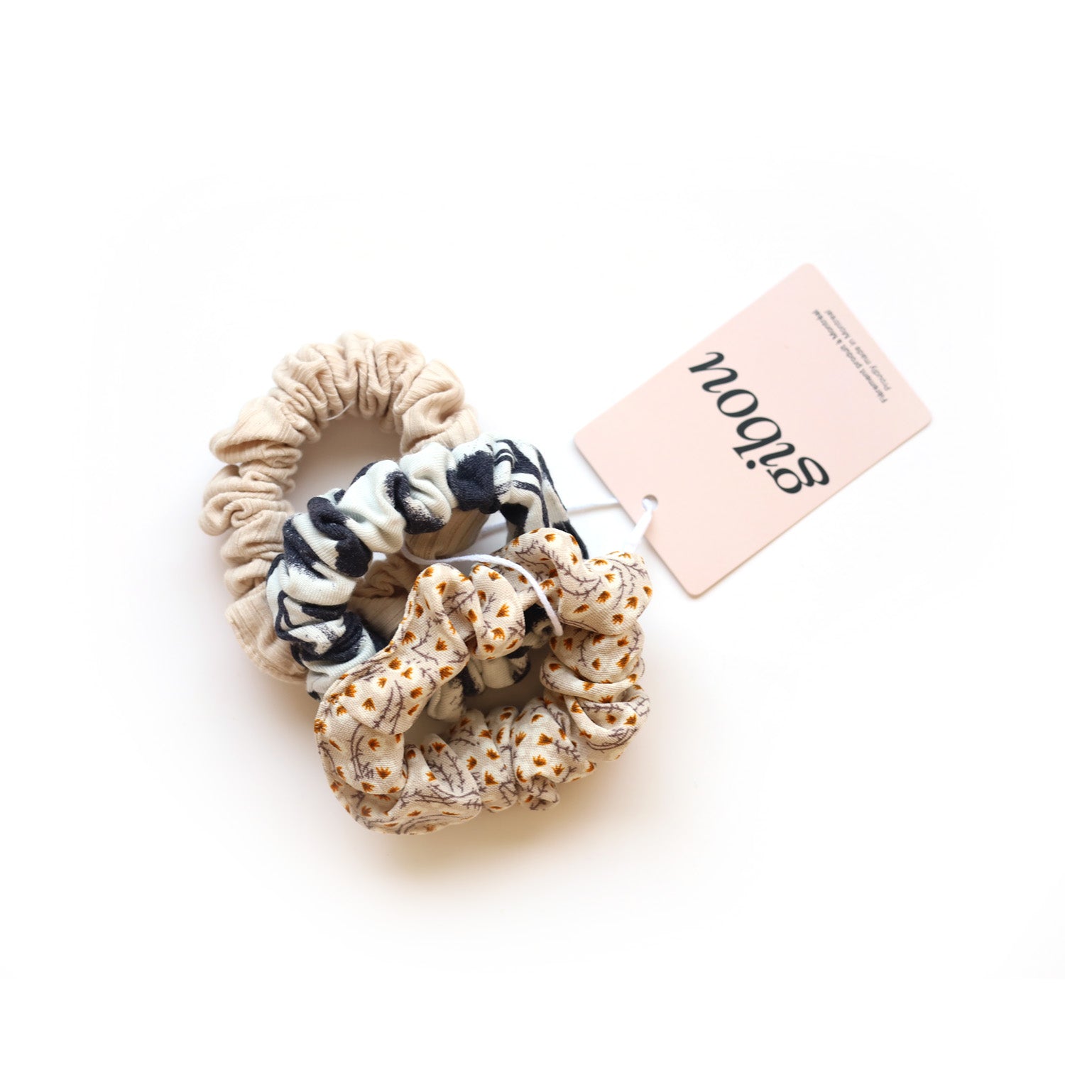 Trio of mini scrunchies made from upcycled fabric