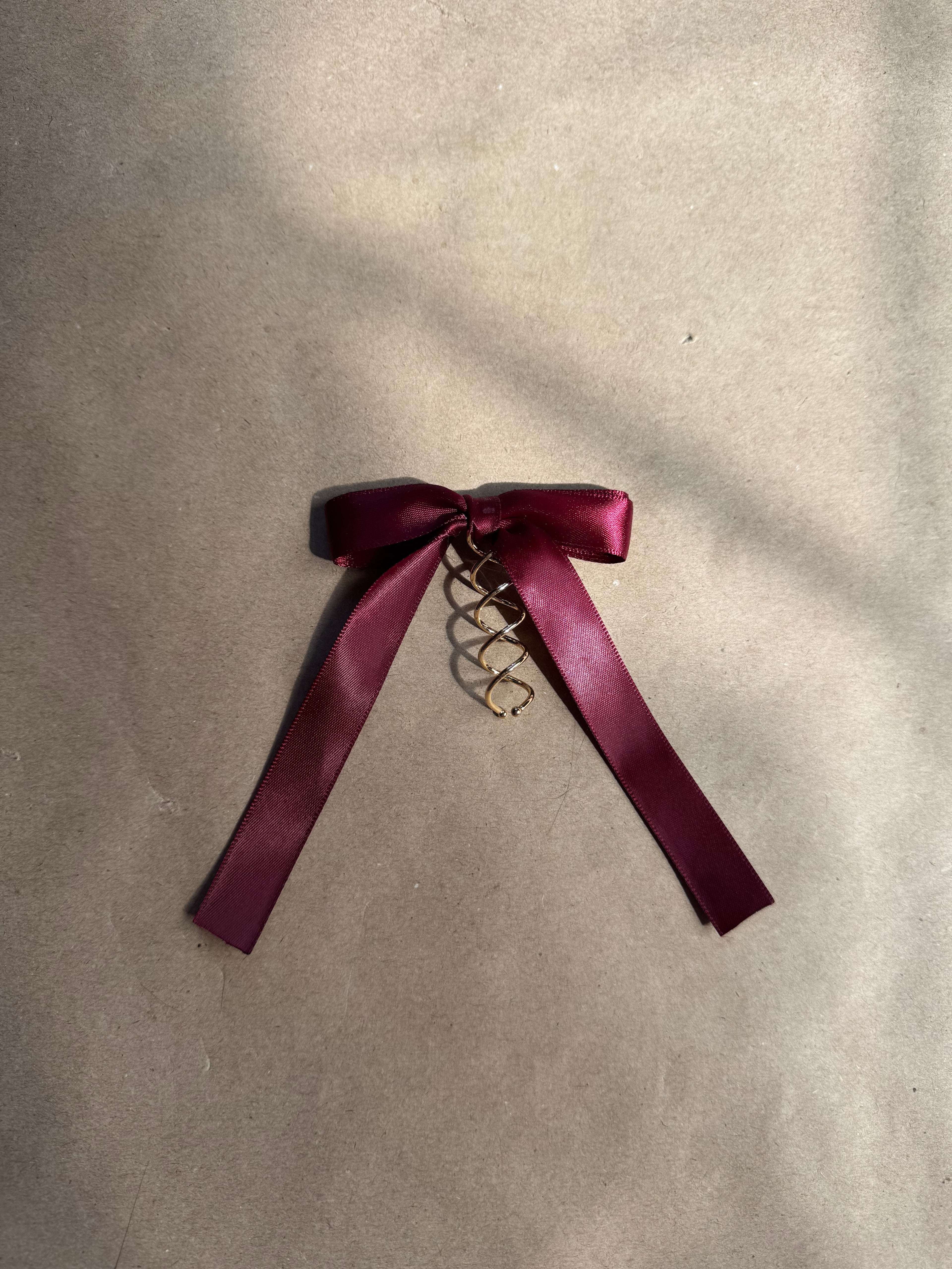 Sample - Black ribbon bow on spiral