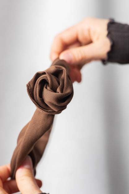 Bandeau à torsader avec tige de métal intégrée