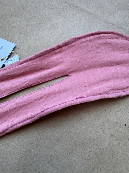 Imparfait - Chignon rose avec couture imparfaite