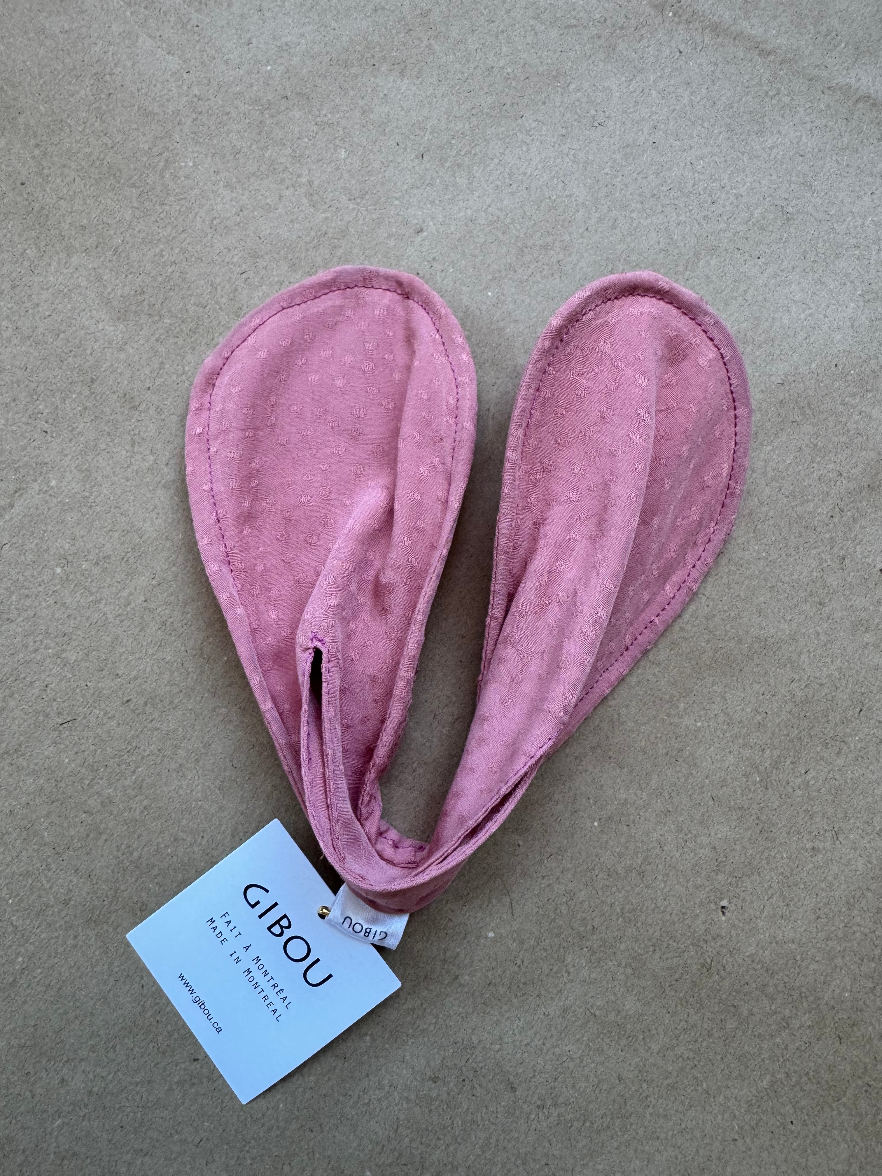 Imparfait - Chignon rose avec couture imparfaite