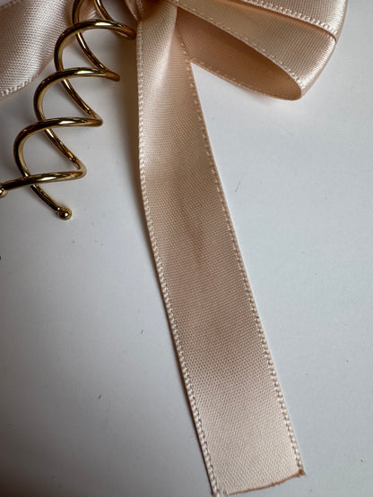 Imparfait - Boucle sur spirale en rosé