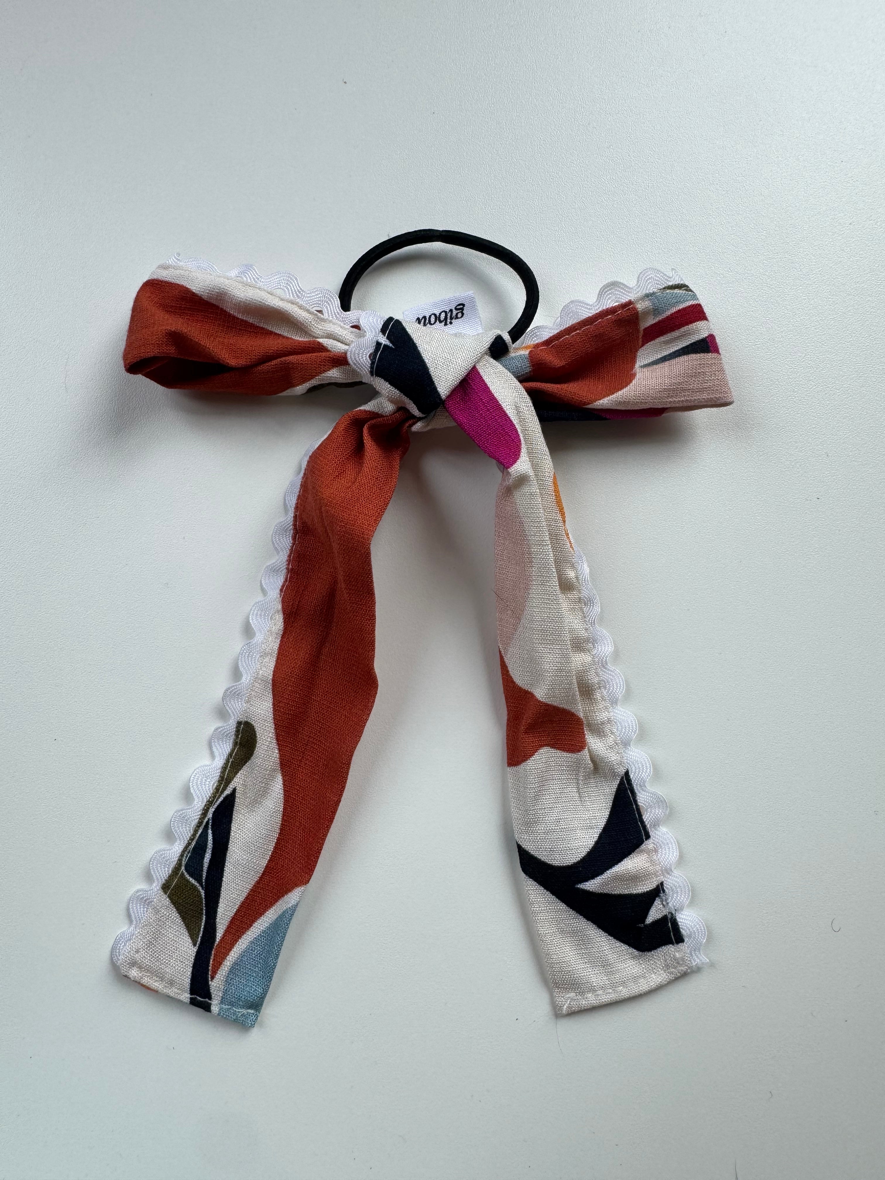 Échantillon - Boucle coloré avec bordure zigzag